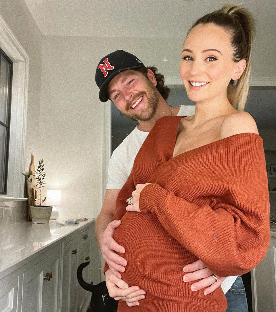 <p>Baby on the way this Valentine's Day! The country singer and <em>Bachelor</em> alum shared a <a href="https://www.instagram.com/p/CLSphLIBPZt/" rel="nofollow noopener" target="_blank" data-ylk="slk:sweet bump photo;elm:context_link;itc:0;sec:content-canvas" class="link ">sweet bump photo</a> from their home in Nashville, Tennessee, to celebrate the holiday. </p>