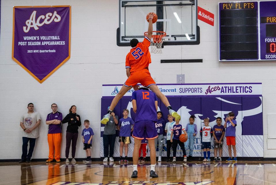 Evansville’s Yacine Toumi (10) cleans Evansville’s Chris Moncrief (12) in the dunk contest during Meeks Madness at the Meeks Family Fieldhouse in Evansville, Ind., Saturday evening, Oct. 15, 2022. 