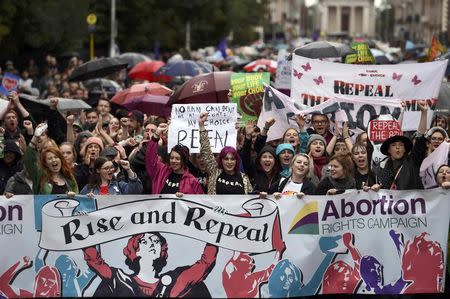 Demonstrators take part in a protest to urge the Irish Government to repeal the 8th amendment to the constitution, which enforces strict limitations to a woman's right to an abortion, in Dublin, Ireland September 24, 2016. REUTERS/Clodagh Kilcoyne