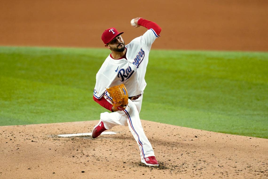 Texas Rangers starting pitcher Martin Perez throws to the Houston Astros in the fourth inning of a baseball game, Thursday, April 28, 2022, in Arlington, Texas. (AP Photo/Tony Gutierrez)