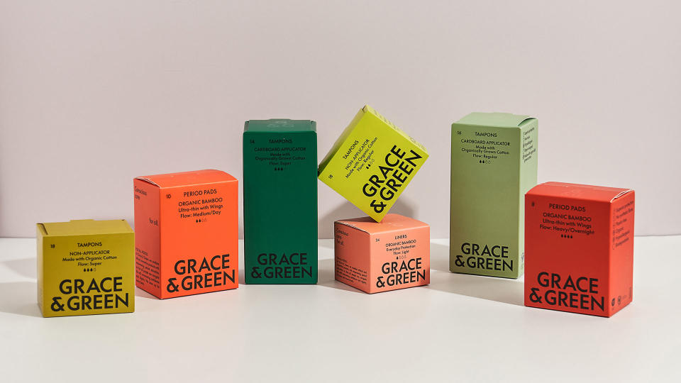 Grace & Green packaging for tampons and sanitary towels in greens and red packaging