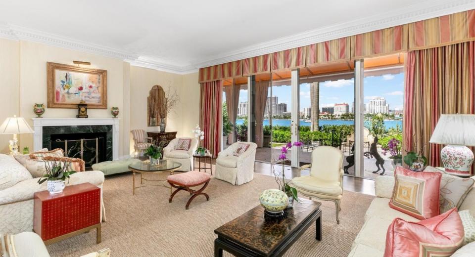 In Midtown Palm Beach, the living room at 315 Chapel Road looks out to the Intracoastal Waterway and downtown West Palm Beach. The property just entered the market with a price of $59.5 million.