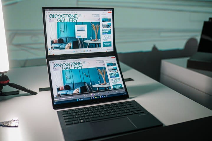 The two screens of the Asus Zenbook Duo on a white table.