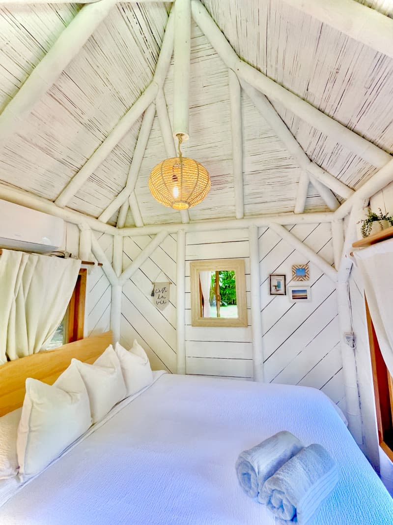 White wood and bamboo bedroom.