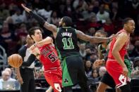 Dec 8, 2018; Chicago, IL, USA; Boston Celtics guard Kyrie Irving (11) defends Chicago Bulls guard Ryan Arcidiacono (51) during the first half at United Center. Patrick Gorski-USA TODAY Sports