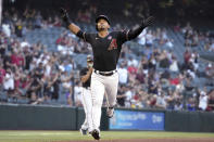 Arizona Diamondbacks Eduardo Escobar celebrates after hitting a three-run home run against the Washington Nationals during the fourth inning of a baseball game, Saturday, May 15, 2021, in Phoenix. (AP Photo/Rick Scuteri)