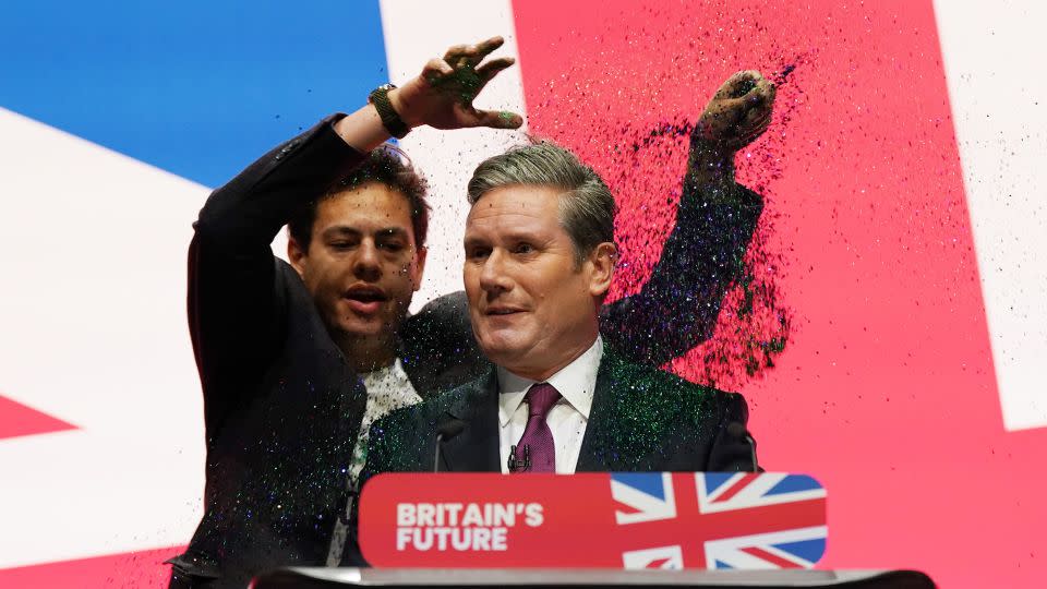 A protestor throws glitter over Labour party leader, Keir Starmer during the leader's speech at the Labour Party conference on October 10, 2023 in Liverpool, England.  - Ian Forsyth/Getty Images