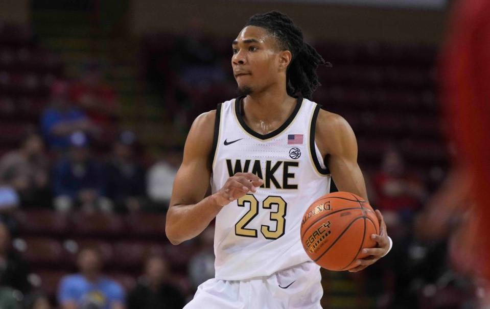 Nov 16, 2023; Charleston, South Carolina, USA; Wake Forest Demon Deacons guard Hunter Sallis (23) brings the ball up court in the first half against the Utah Utes at TD Arena.