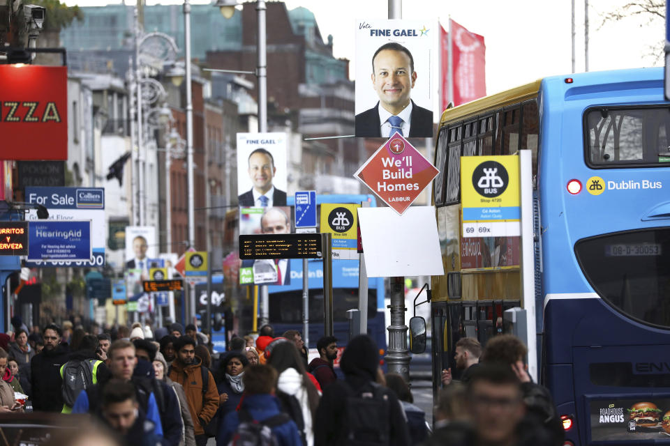 Election posters are displayed on lampposts in Dublin, Ireland, Friday, Feb. 7, 2020. Irish voters will choose a new parliament on Saturday, and may have bad news for the two parties that have dominated the country’s politics for a century, Fianna Fail and Fine Gael. Polls show a surprise surge for Sinn Fein, the party historically linked to the Irish Republican Army and its violent struggle for a united Ireland. (AP Photo/Peter Morrison)