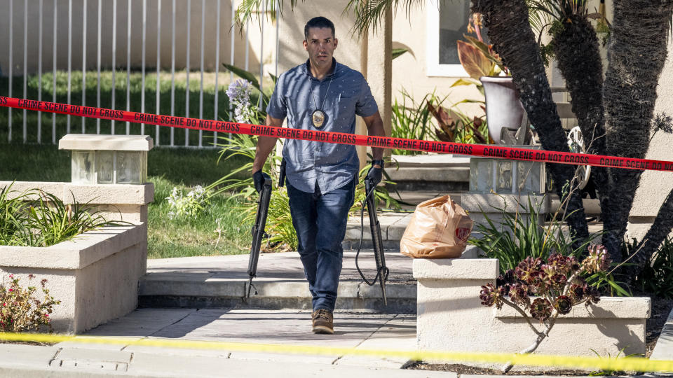 Investigators remove firearms from a house in Anaheim, CA on Friday, August 4, 2023.  Orange County Superior Court Judge Jeffrey Ferguson was arrested late Thursday, Aug. 3, 2023 after police received reports of a shooting in an Anaheim home and found the judges wife, Sheryl Ferguson, inside with at least one fatal gunshot wound, police said. / Credit: Paul Bersebach/MediaNews Group/Orange County Register via Getty Images