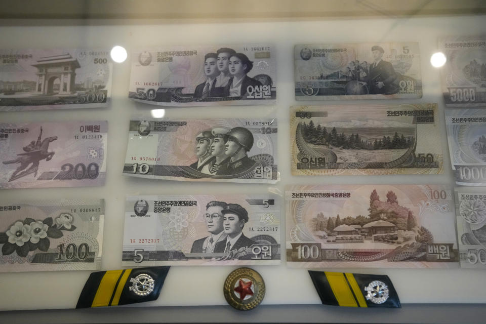 North Korean bank notes are displayed at an exhibition hall of the observation post in Ganghwa, South Korea, Thursday, May 11, 2023. North Korea has tolerated the widespread use of more stable foreign currencies like U.S. dollars and Chinese yuan since a bungled revaluation of the won in 2009 triggered runaway inflation and public unrest. The so-called “dollarization” helped ease inflation and stabilize exchange rates, enabling leader Kim Jong Un to establish a stable hold on power after he inherited that role in late 2011. (AP Photo/Lee Jin-man)