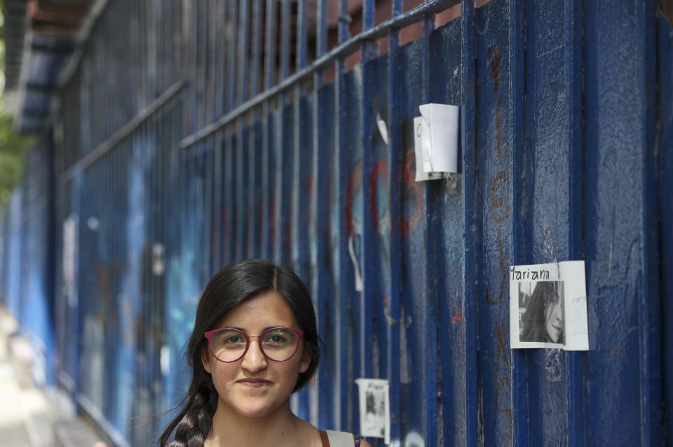 Recent university graduate Catalina Santana, 18, poses for a portrait prior to interview in Santiago, Chile, Dec. 2, 2019. Nearly two months ago, Santana jumped a turnstile in the Santiago metro and helped launch a movement that changed the course of Chilean history. (AP Photo/Esteban Felix)