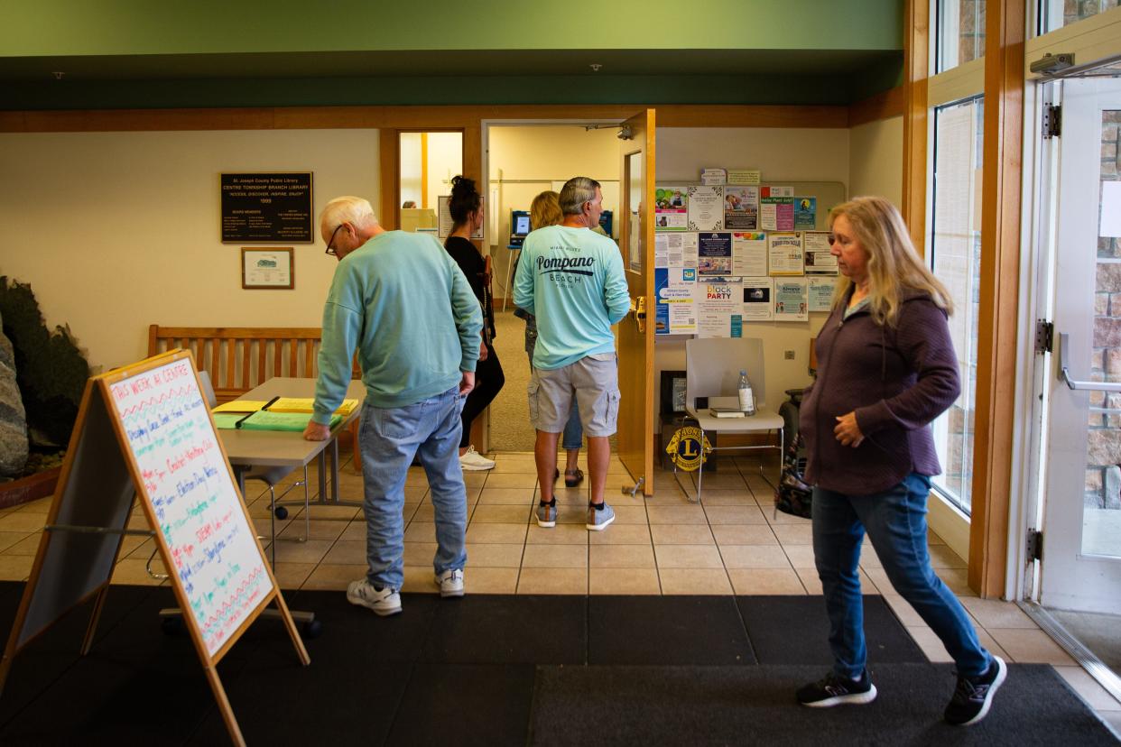 Voters line up to cast their ballots on Tuesday, May 7, 2024, at Centre Township Library in South Bend.