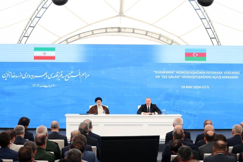 Azerbaijani President Ilham Aliyev and Iranian President Ebrahim Raisi attend the inauguration ceremony of the Qiz Qalasi Dam, on the Iran-Azerbaijan border.  A helicopter carrying Iranian President Ebrahim Raisi had to make an emergency landing in the west of the country on Sunday, state media reported.  -/dpa