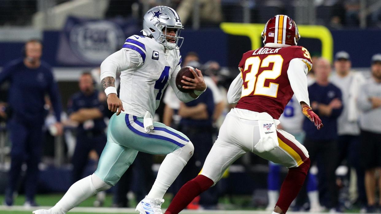 ARLINGTON, TEXAS - DECEMBER 29: Dak Prescott #4 of the Dallas Cowboys runs the ball against the Washington Redskins at AT&T Stadium on December 29, 2019 in Arlington, Texas.