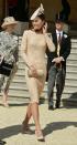 <p>The Duchess stunned in a bespoke nude dress by Alexander McQueen for Buckingham Palace’s garden party. Kate accessorised with a coordinating hat by Jane Corbett and nude heels by Russell and Bromley. </p><p><i>[Photo: PA]</i></p>
