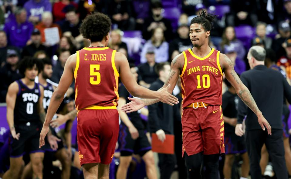 Jan 20, 2024; Fort Worth, Texas, USA; Iowa State Cyclones guard Keshon Gilbert (10) celebrates with Iowa State Cyclones guard Curtis Jones (5) during the first half against the TCU Horned Frogs at Ed and Rae Schollmaier Arena. Mandatory Credit: Kevin Jairaj-USA TODAY Sports