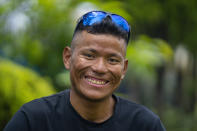 Nepal's sherpa guide Tenjen Sherpa, 35, who with Norwegian climber Kristin Harila climbed the world's 14 tallest mountains in record time, poses during an interview with the Associated Press in Kathmandu, Nepal, Wednesday, Aug. 9, 2023. Sherpa and Harila shattered the record for the fastest climb of the 14 mountains more than 8,000 meters (about 26,000 feet) high when they topped Mount K2 in Pakistan late last month. The previous record was 189 days, and the pair did it in 92 days. (AP Photo/Niranjan Shrestha)