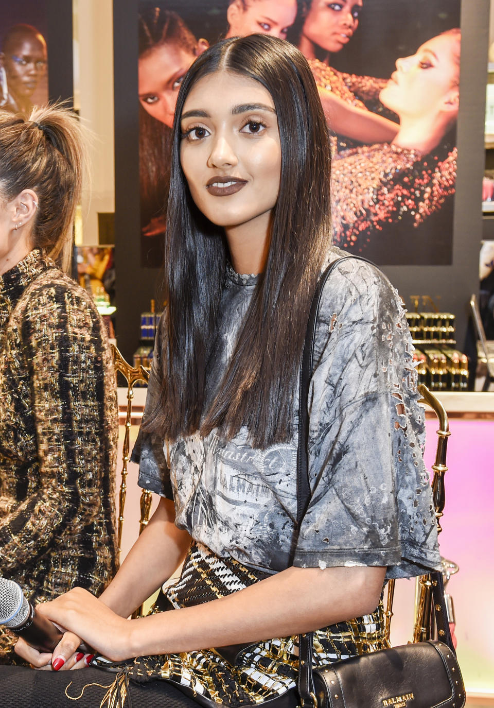 <p>The British fashion model attende the launch of the L’Oreal Paris x Balmain Paris collection lipstick ain London sporting pin-straight, center-parted hair and dark brown lipstick. (Photo by David M. Benett/Dave Benett /Getty Images for L’Oreal Paris) </p>