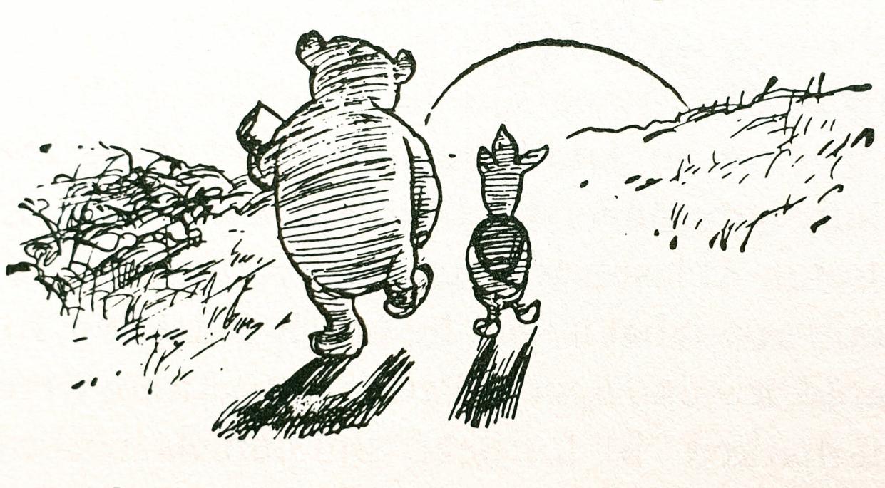 Winnie the Pooh and Piglet walking into the sunset.