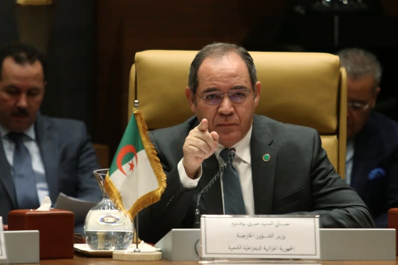 Algerian Foreign Minister Sabri Boukadoum gestures during a meeting with foreign Ministers and officials from countries neighbouring Libya to discuss the conflict in Libya, in Algiers