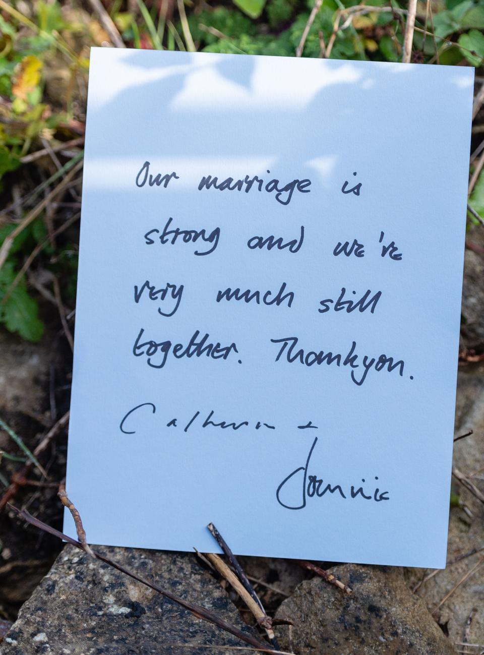 Handwritten note expressing strength of marriage and gratitude, signed by a couple