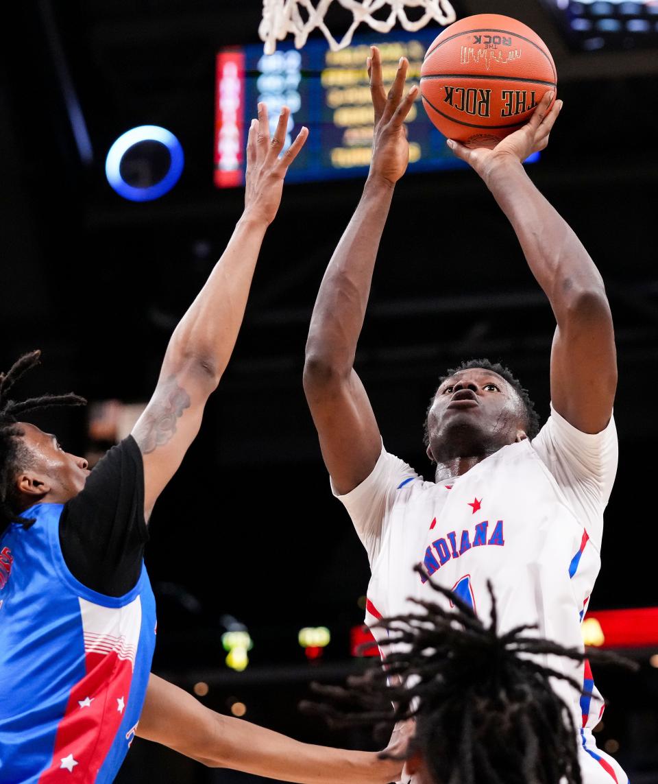 Indiana All-Star Flory Bidunga (1) goes in to shoot the ball Saturday, June 8, 2024, during the boys seniors All-Star game at Gainbridge Fieldhouse in Indianapolis. Indiana All-Stars defeated the Kentucky All-Stars.