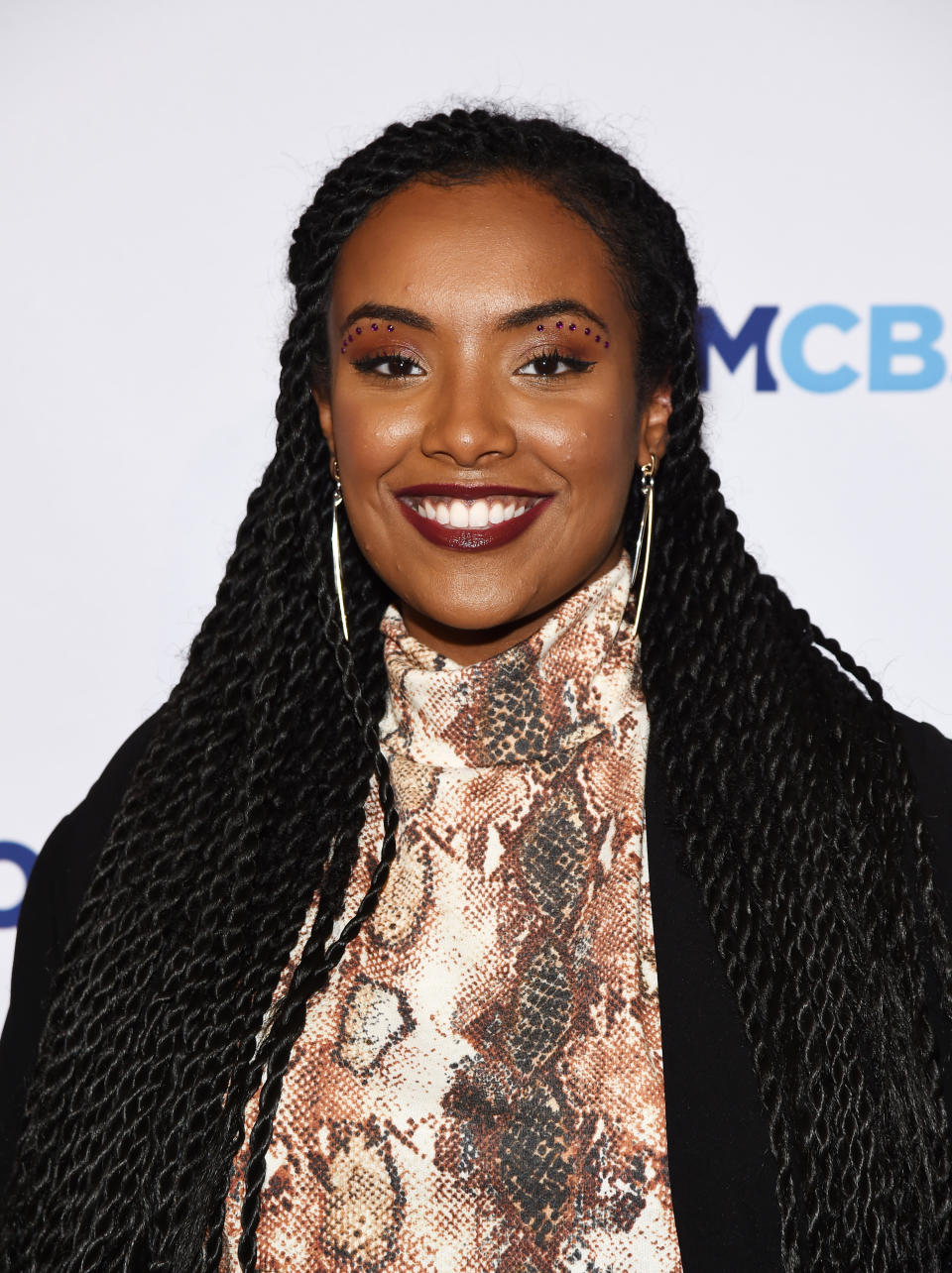 Aida Osman smiles at a 2020 CBS event