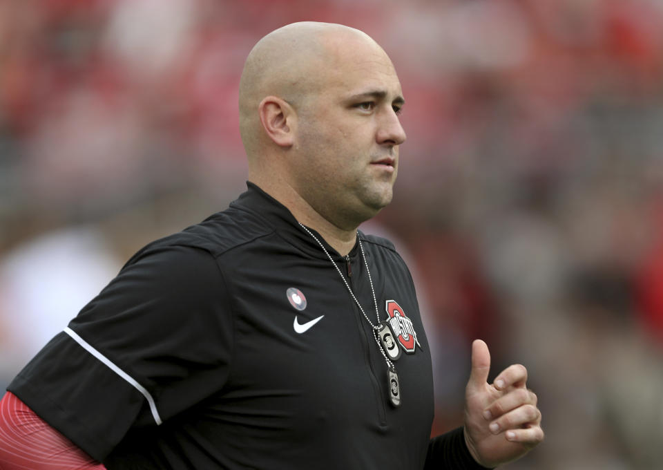 In this Sept. 16, 2017 photo, Ohio State assistant coach Zach Smith watches before the start of an NCAA college football game against Army in Columbus, Ohio. What has transpired over the last three weeks at Ohio State should be a lesson to all coaches. Your football program is not a family. Urban Meyer treated Zach Smith like family, and it almost cost one of the most accomplished coaches in college football his job. (Marvin Fong//The Plain Dealer via AP)