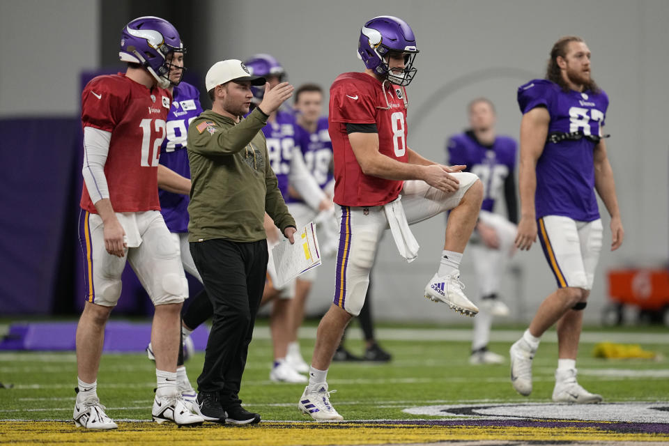 Minnesota Vikings quarterback Kirk Cousins (8) takes part in drills during an NFL football team practice in Eagan, Minn., Thursday, Jan. 12, 2023. The Vikings will play the New York Giants in a wild-card game on Sunday. (AP Photo/Abbie Parr)