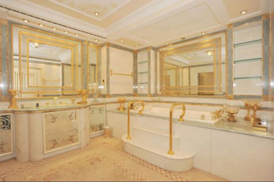 A gold-accented bathroom (Handout)