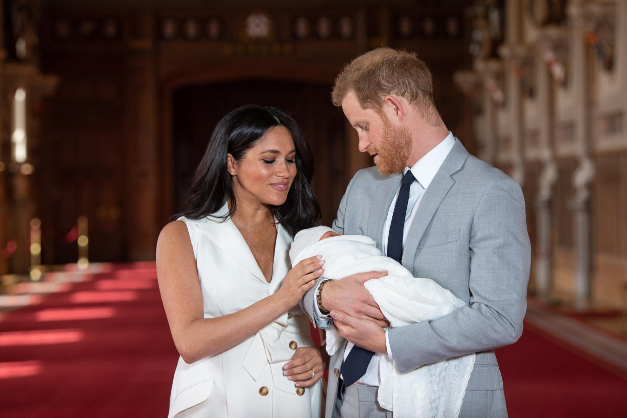 The Duke and Duchess of Sussex with their baby son, who was born on Monday morning, during a photocall in St George's Hall at Windsor Castle in Berkshire.