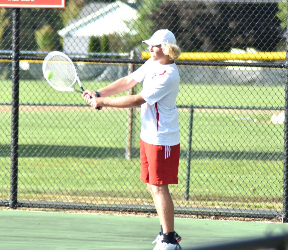 Coldwater's Sam Larr returns a back hand versus Gull Lake on Thursday