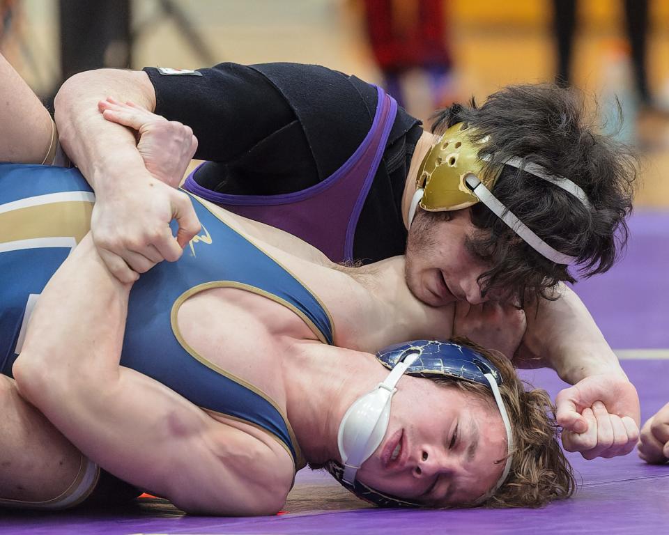 Fowlerville's Ben Blyveis beat Chelsea's Elijah Ratliff for the 150-pound regional wrestling championship at Jackson Northwest.