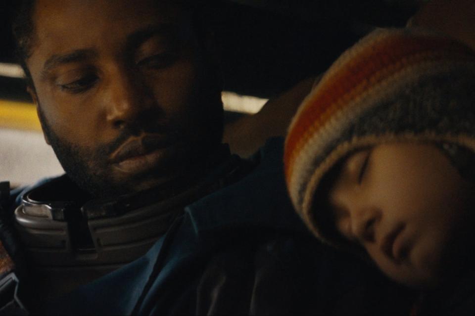 John David Washington and Madeleine Yuna Voyles in The Creator (20th Century Studios)