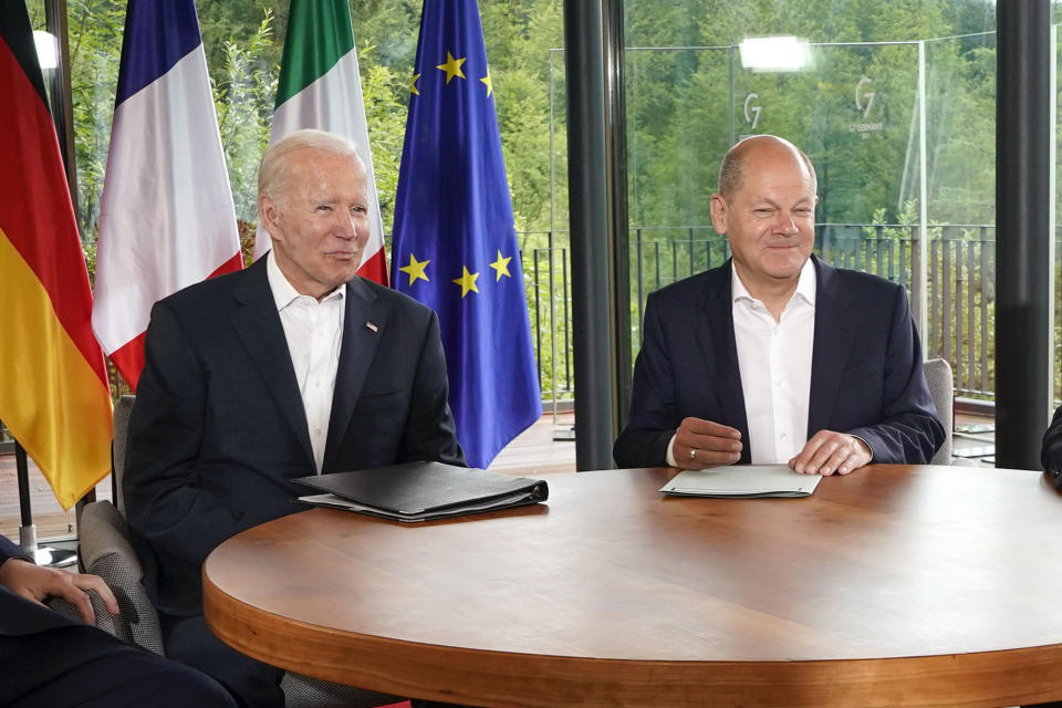 FILE - President Joe Biden and German Chancellor Olaf Scholz meet on the sidelines of the G7 summit at Castle Elmau in Kruen, near Garmisch-Partenkirchen, Germany, on June 28, 2022. Scholz is visiting the White House on Friday, March 3, 2023, to meet with Biden. (AP Photo/Susan Walsh, File)