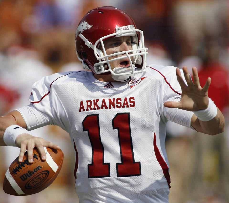 Arkansas quarterback Casey Dick looks toward his receivers during second quarter NCAA college football action against <a class="link " href="https://sports.yahoo.com/ncaaf/teams/texas/" data-i13n="sec:content-canvas;subsec:anchor_text;elm:context_link" data-ylk="slk:Texas;sec:content-canvas;subsec:anchor_text;elm:context_link;itc:0">Texas</a>, Saturday, Sept. 27, 2008, in Austin, Texas. (AP Photo/Harry Cabluck)