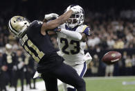 FILE - In this Jan. 20, 2019, file photo, Los Angeles Rams' Nickell Robey-Coleman breaks up a pass intended for New Orleans Saints' Tommylee Lewis during the second half of the NFL football NFC championship game in New Orleans. (AP Photo/Gerald Herbert, File)