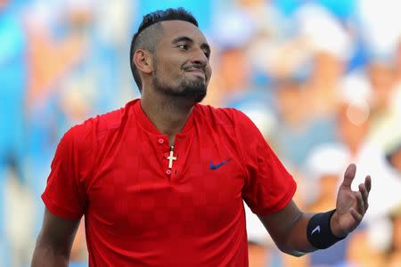 Aug 20, 2017; Mason, OH, USA; Nick Kyrgios (AUS) reacts against Grigor Dimitrov (BUL) in the finals during the Western and Southern Open at the Lindner Family Tennis Center. Mandatory Credit: Aaron Doster-USA TODAY Sports