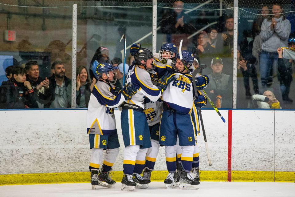 Riley players celebrate scoring during the Riley vs. Fort Wayne Carroll 2A state championship hockey game Satrurday, March 5, 2022 at the Ice Box in South Bend. 