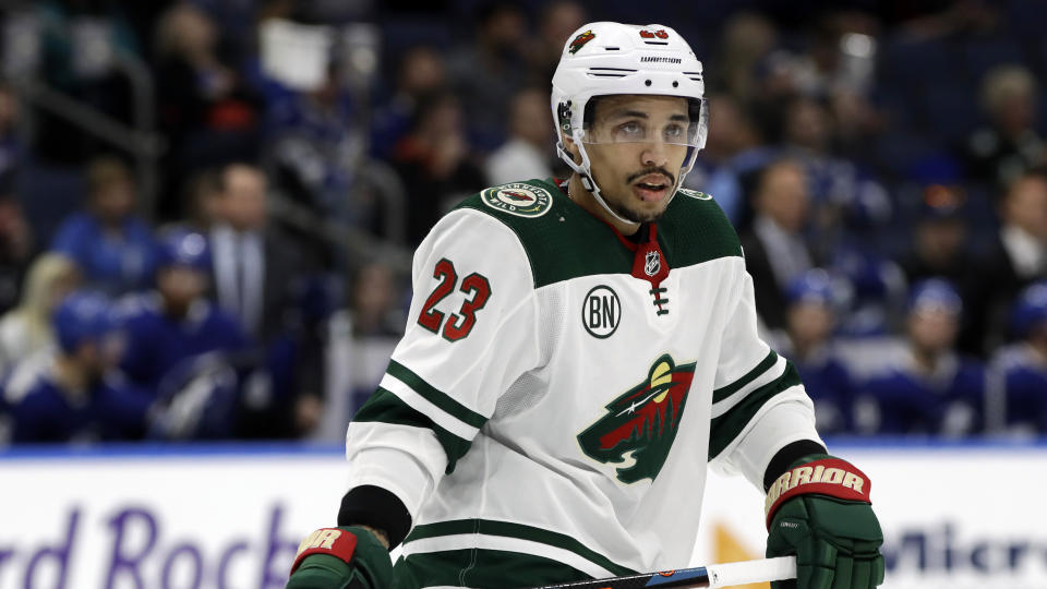 FILE - This March 7, 2019 file photo shows Minnesota Wild right wing J.T. Brown during the third period of an NHL hockey game against the Tampa Bay Lightning in Tampa, Fla. The predominantly white sport of hockey has a checkered history of racism and a culture of not standing out from the team or speaking out. The death of George Floyd in Minnesota has shattered that silence. (AP Photo/Chris O'Meara, File)