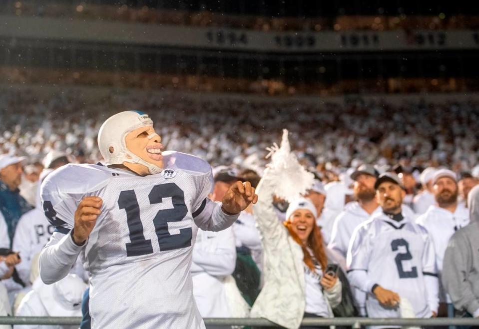 Penn State fans sing and dance during the White Out game against Iowa on Saturday, Sept. 23, 2023.