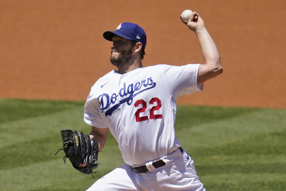 Los Angeles Dodgers starting pitcher Clayton Kershaw throws to the Cincinnati Reds during the first inning of a baseball game Wednesday, April 28, 2021, in Los Angeles. (AP Photo/Marcio Jose Sanchez)