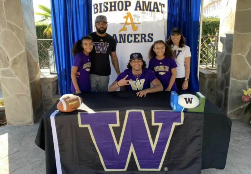 Dyson McCutcheon, with his family, on letter of intent day. The Bishop Amat standout will not play football next month for the Lancers.