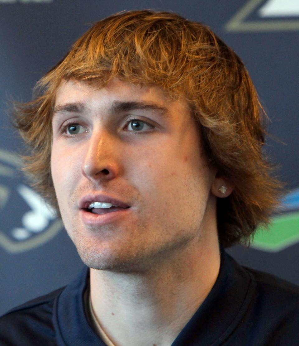 University of Akron basketball player Steve McNees answers questions during media day, Wednesday, Nov. 10, 2010.
