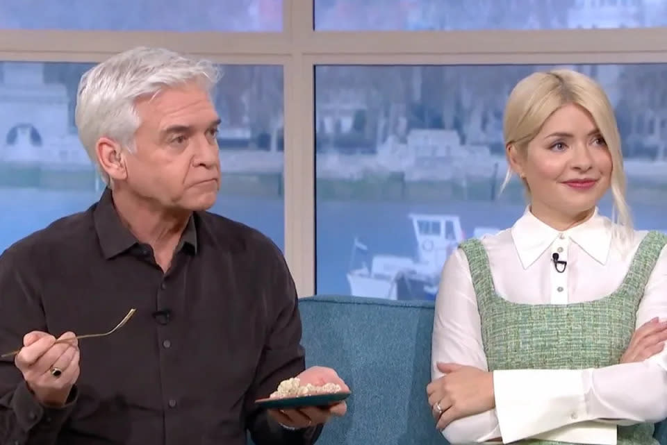 This Morning hosts Holly Willoughby and Phillip Schofield are said to be at odds with each other (This Morning/Twitter)