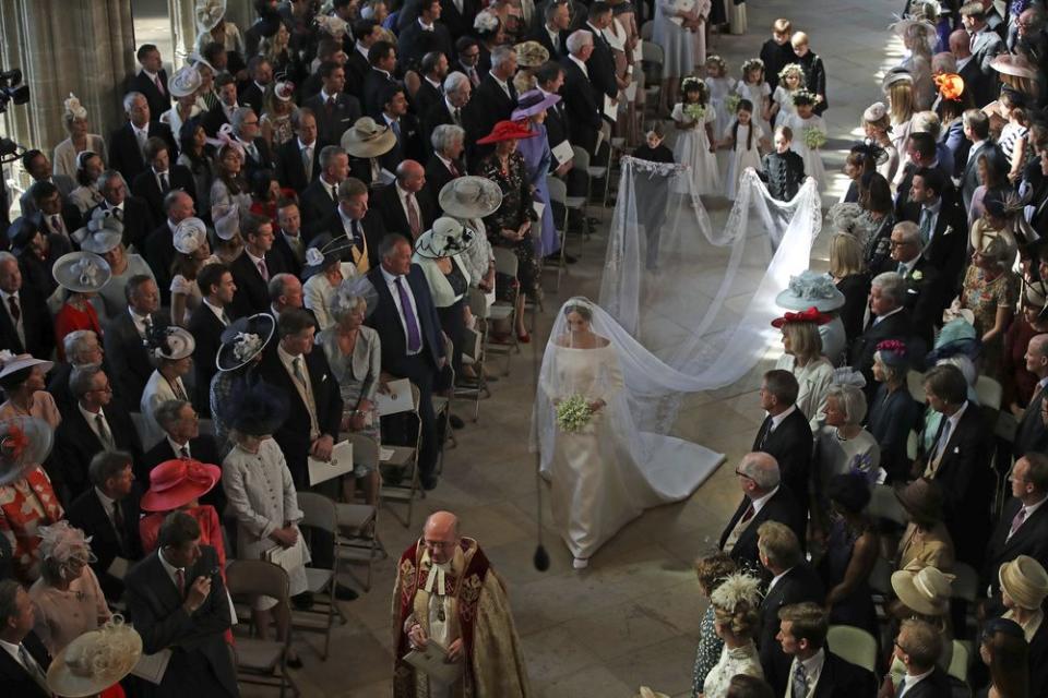 Markle walked the majority of the aisle by herself. (Danny Lawson—