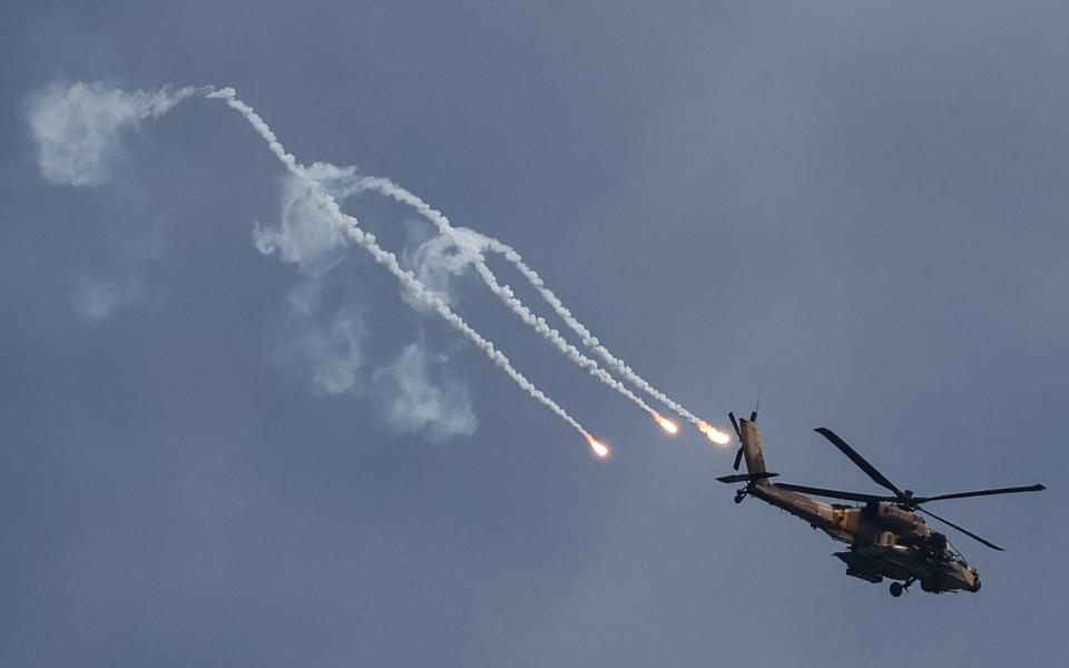 An Israeli army helicopter firing on a target in northern Gaza