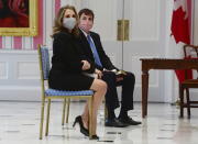 Chrystia Freeland and Dominic LeBlanc sit prior to a swearing in ceremony following a cabinet shuffle at Rideau Hall in Ottawa on Tuesday, August 18, 2020.(Sean Kilpatrick/The Canadian Press via AP)