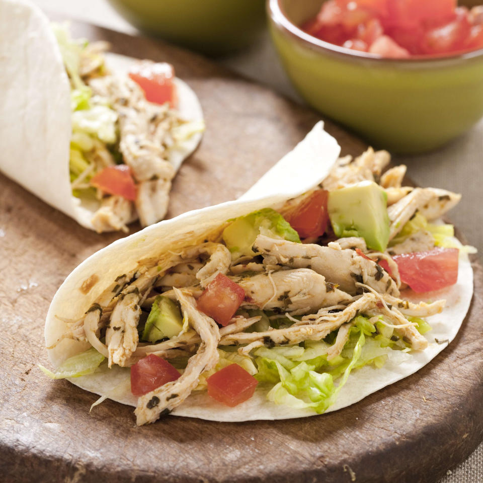 This undated photo provided by America's Test Kitchen in May 2019 shows Easy Weeknight Chicken Tacos in Brookline, Mass. This recipe appears in the book "Cook It In Your Dutch Oven." (Joe Keller/America's Test Kitchen via AP)